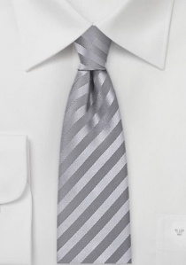 Cravatta stretta a righe tinta unita